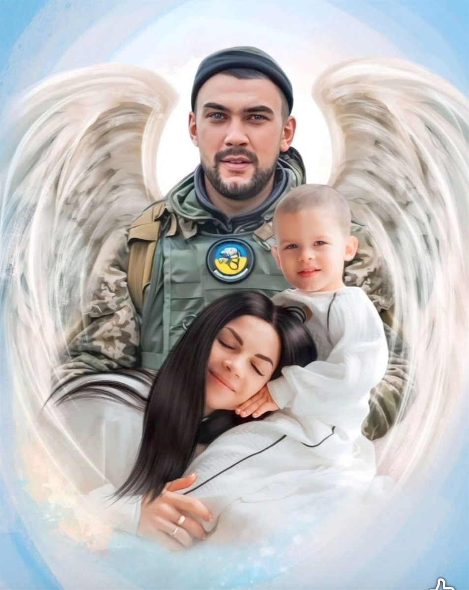 Юлія та Марк біля світлини Антона Валєєва